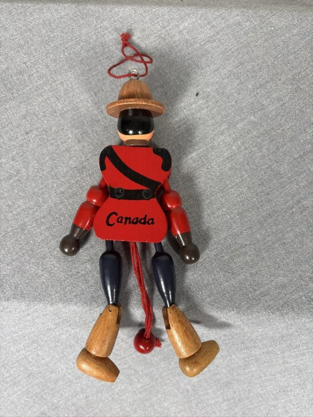 Wooden RCYMP Mountie Royal Canadian Mounted Police Jumping Jack Toy